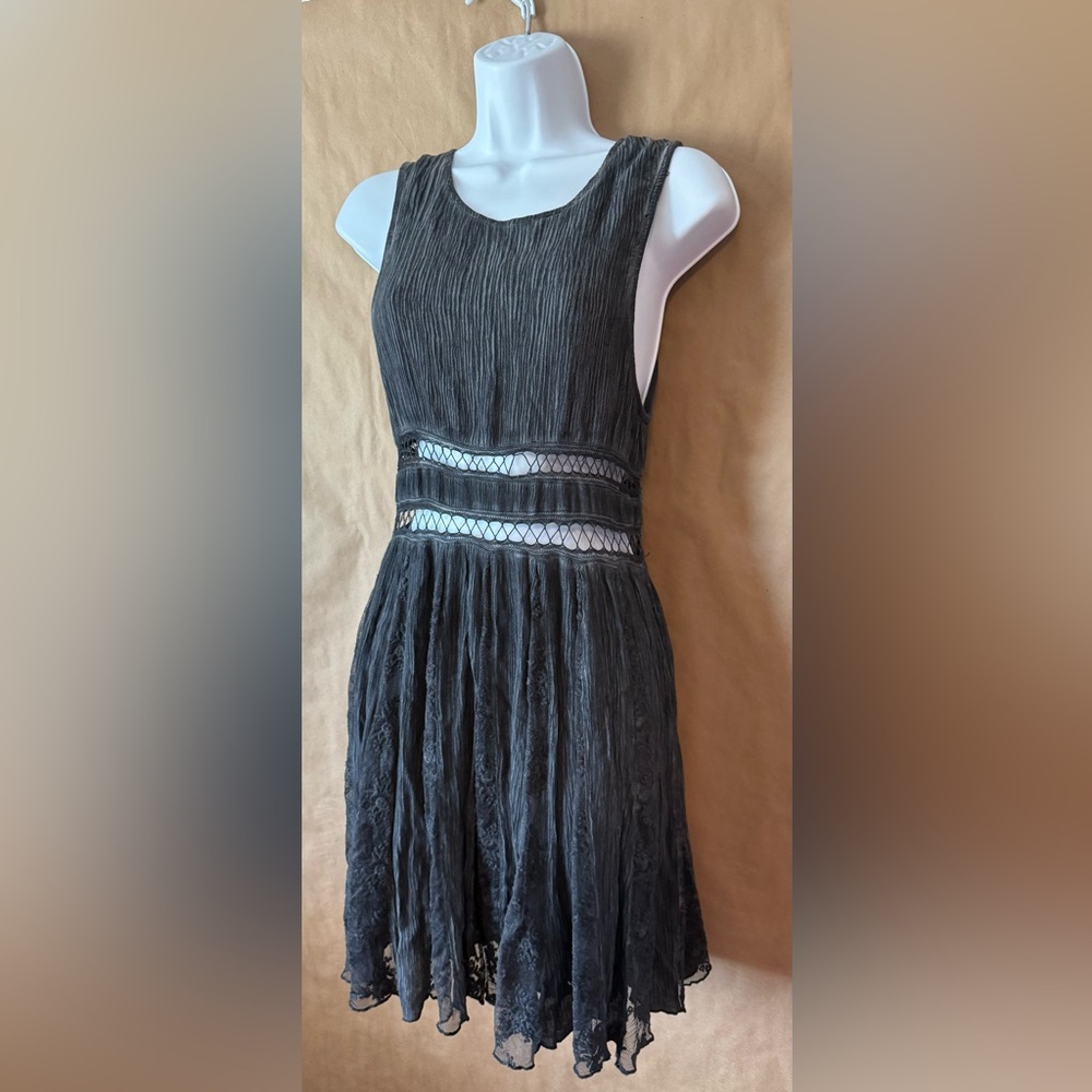 Sea Gypsies black grey sleeveless dress with lace detail over fabric.